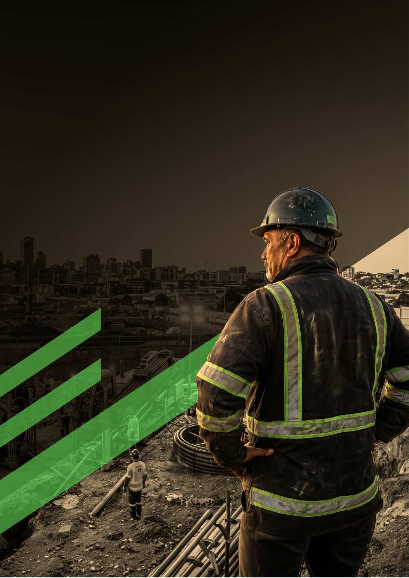 A Sub-Zone crew member on a live Auckland worksite at dusk